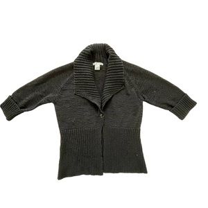 New black 1/2 sleeve sweater with front button to show waist.  Size S